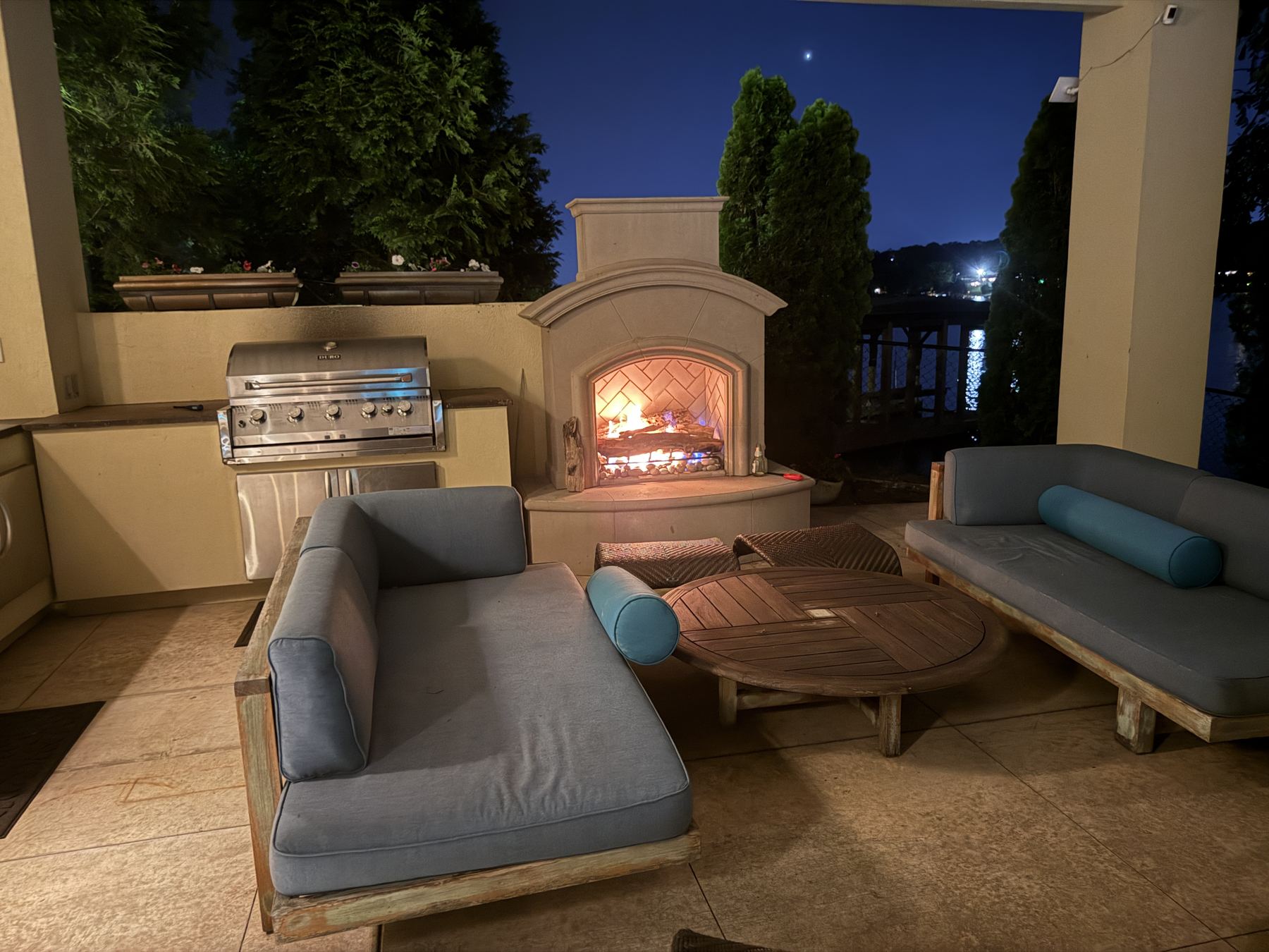 Outdoor fireplace and living area lighting